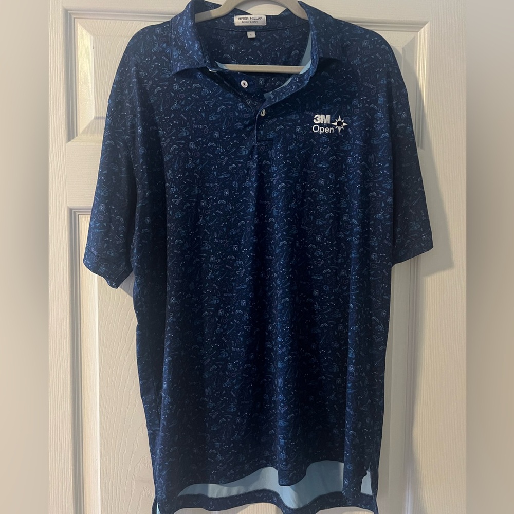 Peter Millar summer comfort polo from 2023 3M Tournament. Gently used.